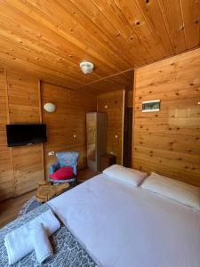 Postel nebo postele na pokoji v ubytování Ayder Paradise Otel