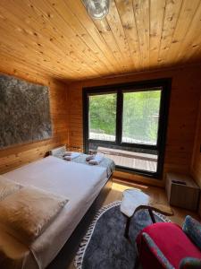 Postel nebo postele na pokoji v ubytování Ayder Paradise Otel