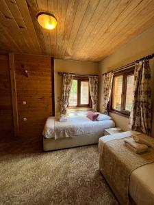 Postel nebo postele na pokoji v ubytování Ayder Paradise Otel