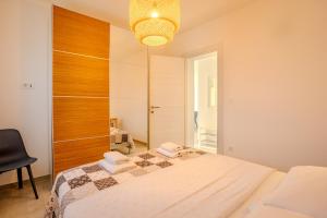 Posteľ alebo postele v izbe v ubytovaní Apartman Polje