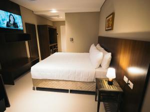 Zielo Hotel tesisinde bir odada yatak veya yataklar