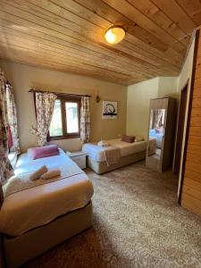 Postel nebo postele na pokoji v ubytování Ayder Paradise Otel