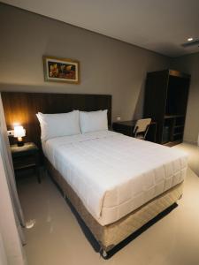 Zielo Hotel tesisinde bir odada yatak veya yataklar