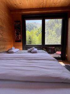 Postel nebo postele na pokoji v ubytování Ayder Paradise Otel