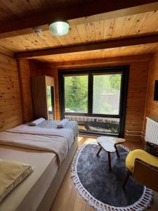 Postel nebo postele na pokoji v ubytování Ayder Paradise Otel