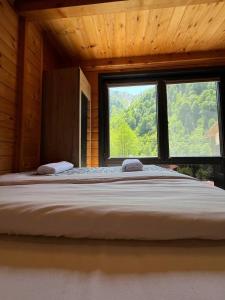 Postel nebo postele na pokoji v ubytování Ayder Paradise Otel
