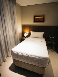 Zielo Hotel tesisinde bir odada yatak veya yataklar