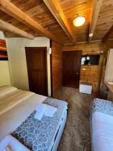 Postel nebo postele na pokoji v ubytování Ayder Paradise Otel