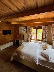 Postel nebo postele na pokoji v ubytování Ayder Paradise Otel