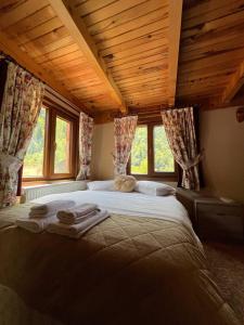 Postel nebo postele na pokoji v ubytování Ayder Paradise Otel