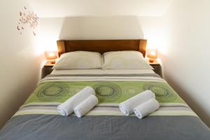 Posteľ alebo postele v izbe v ubytovaní Apartmány Kohoutek a Slepička v Novohradských horách