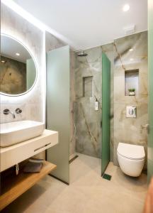 Phòng tắm tại Vela Bianca Suites