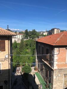 an aerial view of a city with buildings at B&B La Torre di Porta Maggiore in Ascoli Piceno