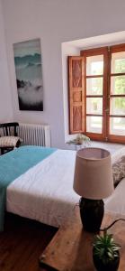 Postel nebo postele na pokoji v ubytování Casa Ines
