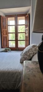 Postel nebo postele na pokoji v ubytování Casa Ines