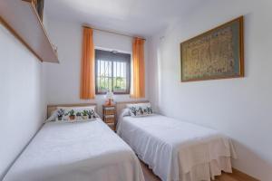 Posteľ alebo postele v izbe v ubytovaní Apartamento en Urbanizacíon Residencial + 29 fotografií
