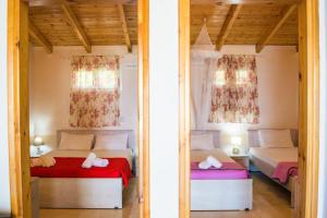 Postel nebo postele na pokoji v ubytování Fanis seafront apartments