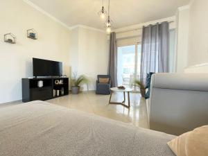 TV/trung tâm giải trí tại Thali central apartment with parking