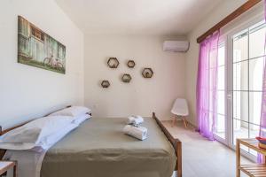Posteľ alebo postele v izbe v ubytovaní Lake House