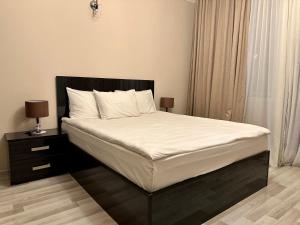Voodi või voodid majutusasutuse Hotel Tsereteli toas