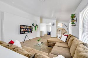 a living room with a couch and a table at Great location near shopping & entertainment in Litchfield Park