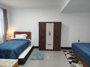 Voodi või voodid majutusasutuse Hotel Ming Shen toas