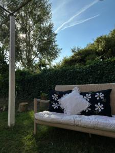 a bench with a white dress sitting on it at Sunny Rentals in Vlorë