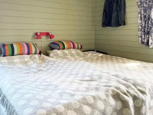 Ένα ή περισσότερα κρεβάτια σε δωμάτιο στο Holiday home SANDÖVERKEN
