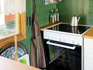Η κουζίνα ή μικρή κουζίνα στο Holiday home SANDÖVERKEN