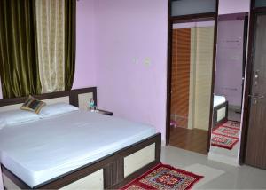 Katil atau katil-katil dalam bilik di Devholiday Home