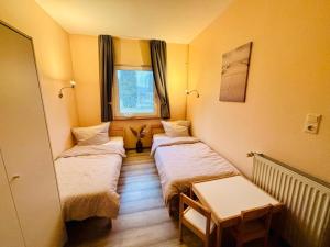 Una cama o camas en una habitación de Ferienhaus Usedom Familie Stopp Haus 24