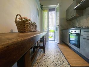 a kitchen with a counter with a basket on it at Ad Agio Apartments in Pisa