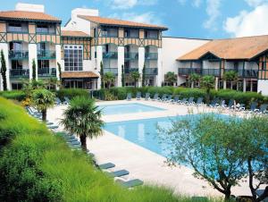 Swimmingpoolen hos eller tæt på Appartement LE DAOUN Dunes, Pins Océan et Golf