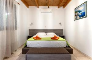 A bed or beds in a room at Villa Rafaela Még 37 kép