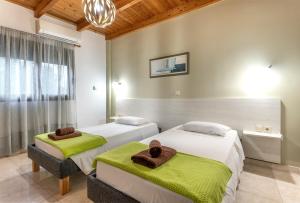 A bed or beds in a room at Villa Rafaela