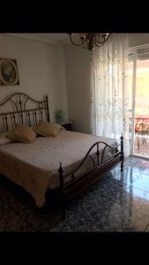 Łóżko lub łóżka w pokoju w obiekcie Casa duplex