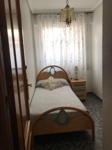Łóżko lub łóżka w pokoju w obiekcie Casa duplex