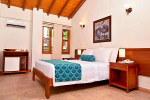 Giường trong phòng chung tại La Campana Hotel Boutique +52 ảnh
