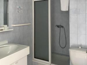 Koupelna v ubytování Hôtel A RENA D'ORU