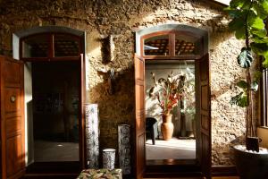 an entrance to a building with a glass door at Cas'Amazonia Brasil in Belém