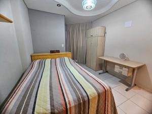 Giường trong phòng chung tại São João Campina Grande