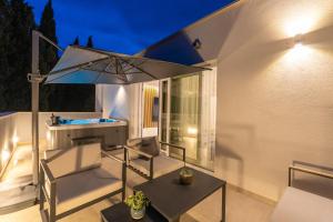 Et opholdsområde på Luxury Villa Entrata