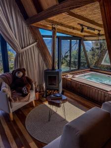 Χώρος καθιστικού στο Chalé de luxo nas montanhas - Urubici