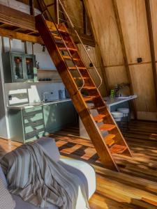 Ένα ή περισσότερα κρεβάτια σε δωμάτιο στο Chalé de luxo nas montanhas - Urubici