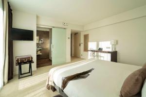 Voodi või voodid majutusasutuse Best Western Plus Villa Saint Antoine Hotel & Spa toas