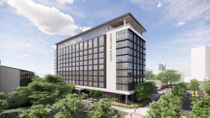 an artist rendering of the office building planned for the corner of the street at Kimpton Santo, an IHG Hotel in San Antonio