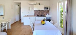 Kuchyň nebo kuchyňský kout v ubytování Apartments Marino