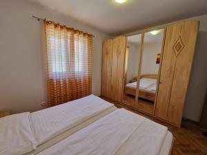 Postel nebo postele na pokoji v ubytování Apartment Jozic