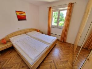 Postel nebo postele na pokoji v ubytování Apartment Jozic