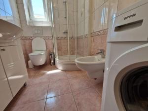 Kúpeľňa v ubytovaní Apartment Jozic + 27 fotografií